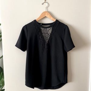 Beautiful Club Monaco short sleeve shirt with lace v neck detail.